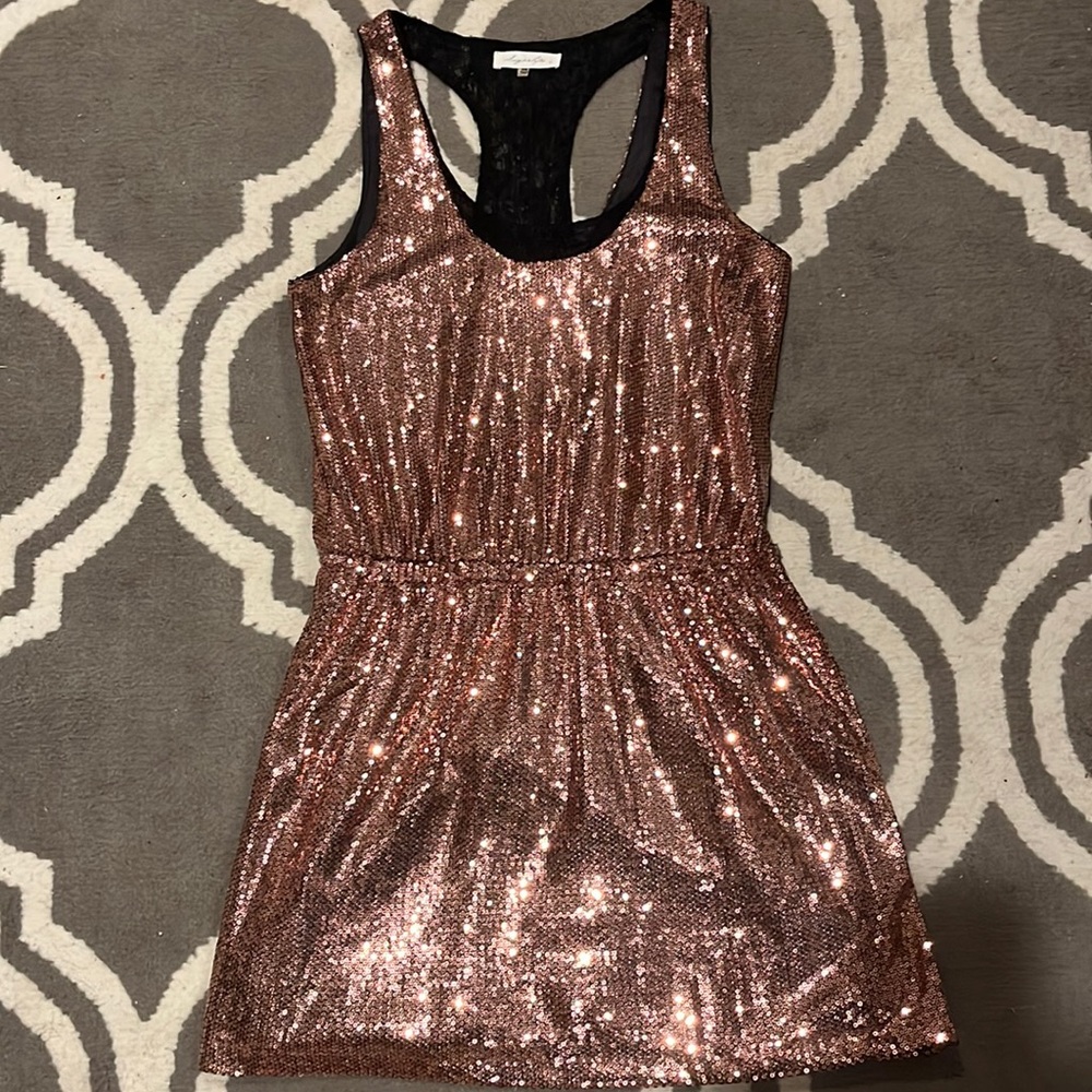 Size xs. Copper New Year’s Eve dress. Used.